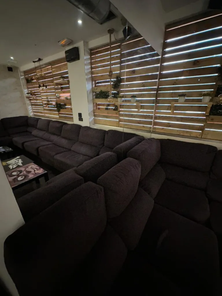 Armchair lounge area at Meltz Social Club Madrid cannabis club