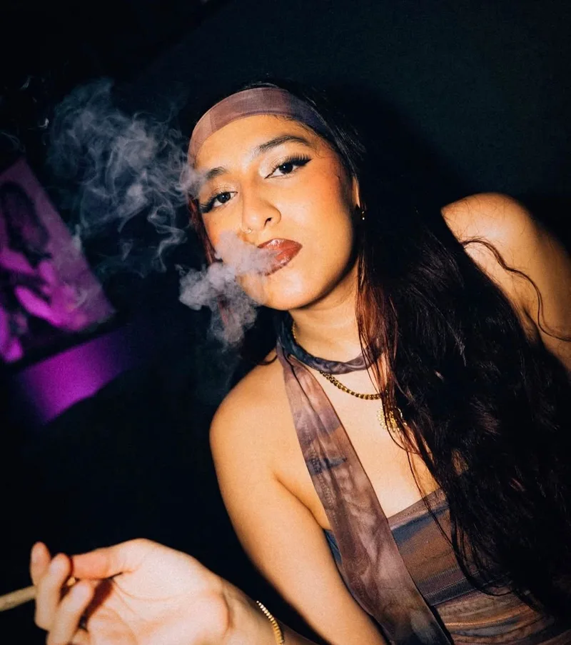 Social atmosphere at Mística cannabis club Madrid showing relaxed members